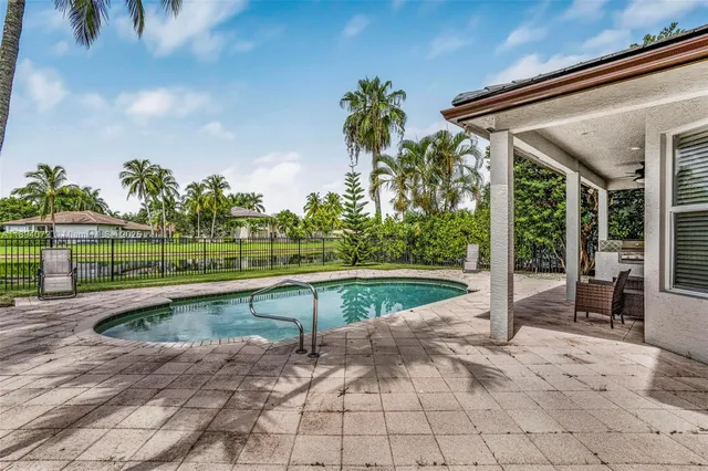 a view of a patio with a backyard