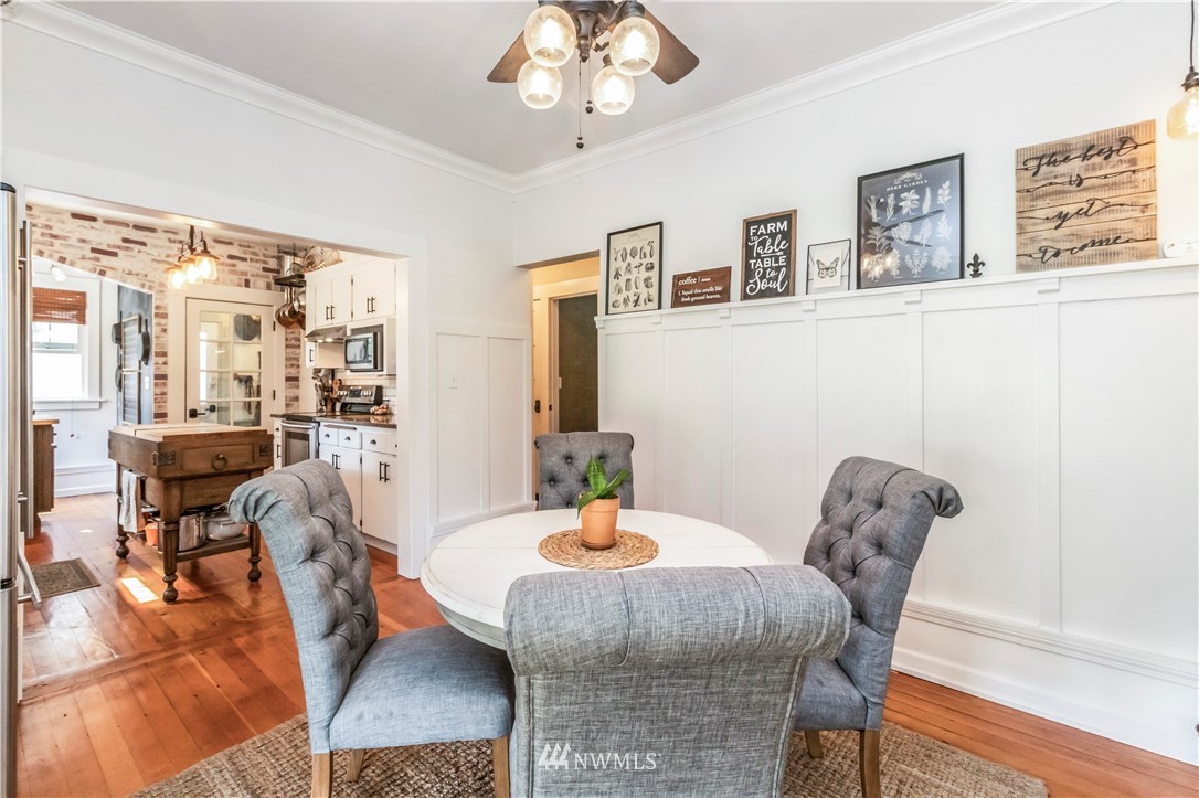 1330 Connors Road Snohomish, WA 98290 - Photo 14 of 39 a dining room with furniture and wooden floor