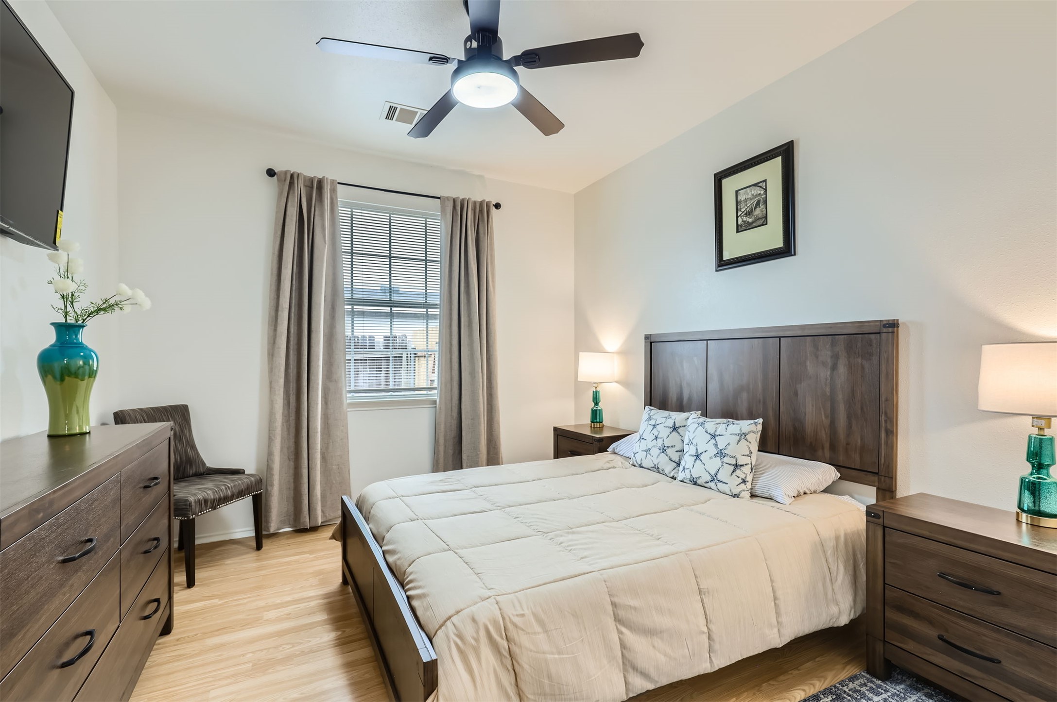 1016 Thackeray Lane Pflugerville, TX 78660 - Photo 20 of 28 Bedroom featuring light wood finished floors and ceiling fan