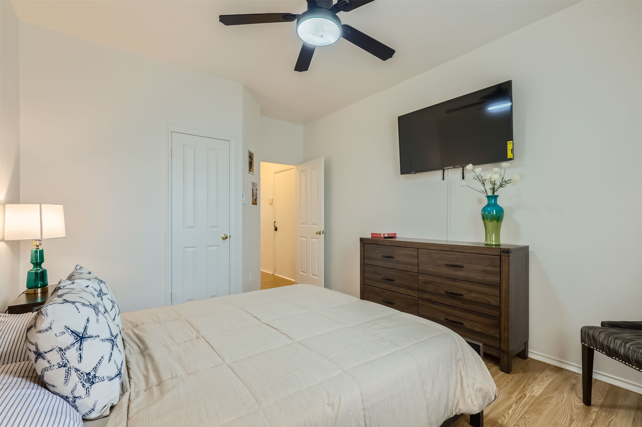 1016 Thackeray Lane Pflugerville, TX 78660 - Photo 21 of 28 Bedroom with wood finished floors and a ceiling fan