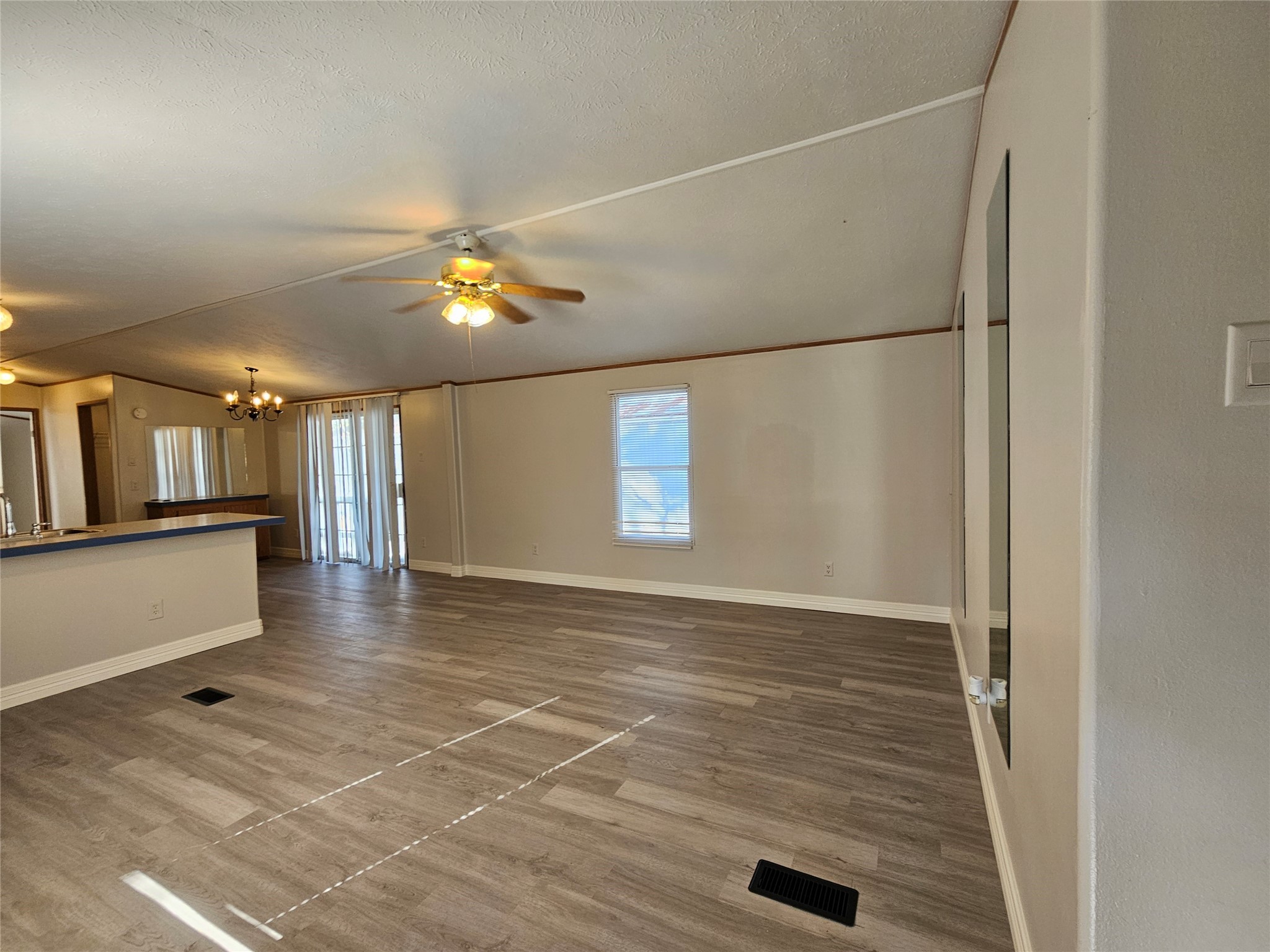 14225 East Ravine Run Willis, TX 77318 - Photo 5 of 27 a view of an empty room with a window