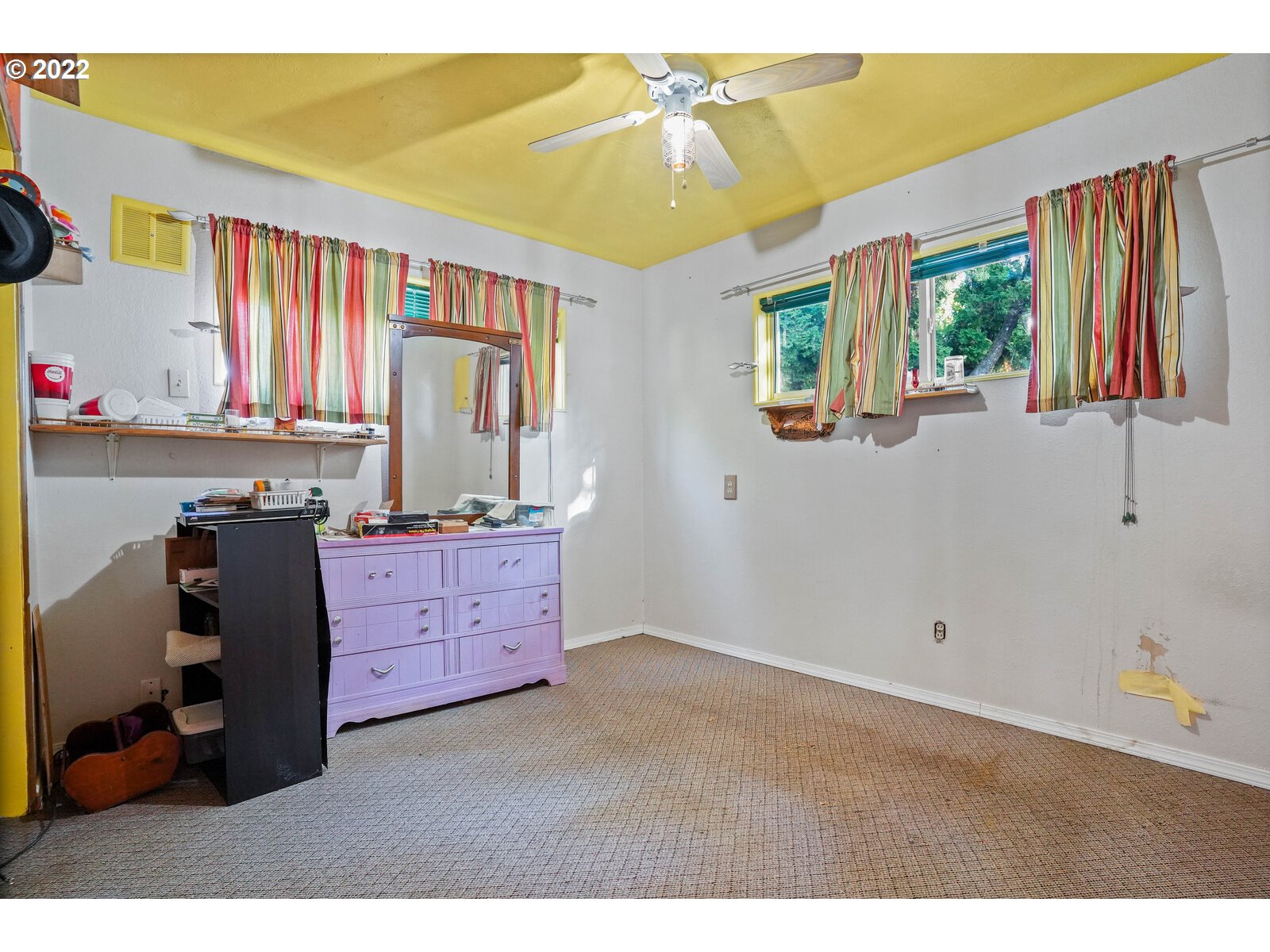 1779 Carroll Street Lebanon, OR 97355 - Photo 18 of 27 a bedroom with a bed and wooden floor