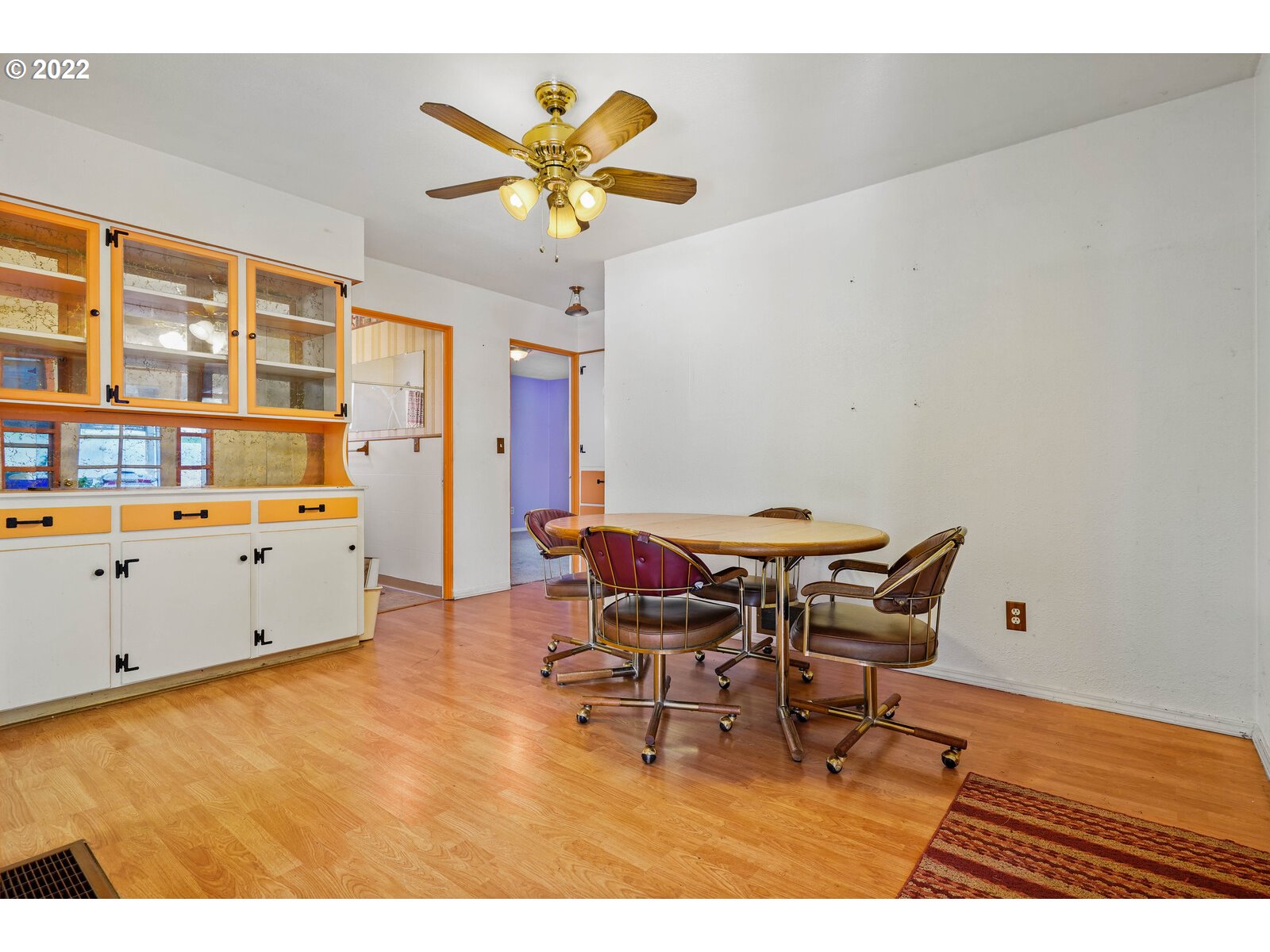 1779 Carroll Street Lebanon, OR 97355 - Photo 8 of 27 a view of a dining room with furniture and chandelier