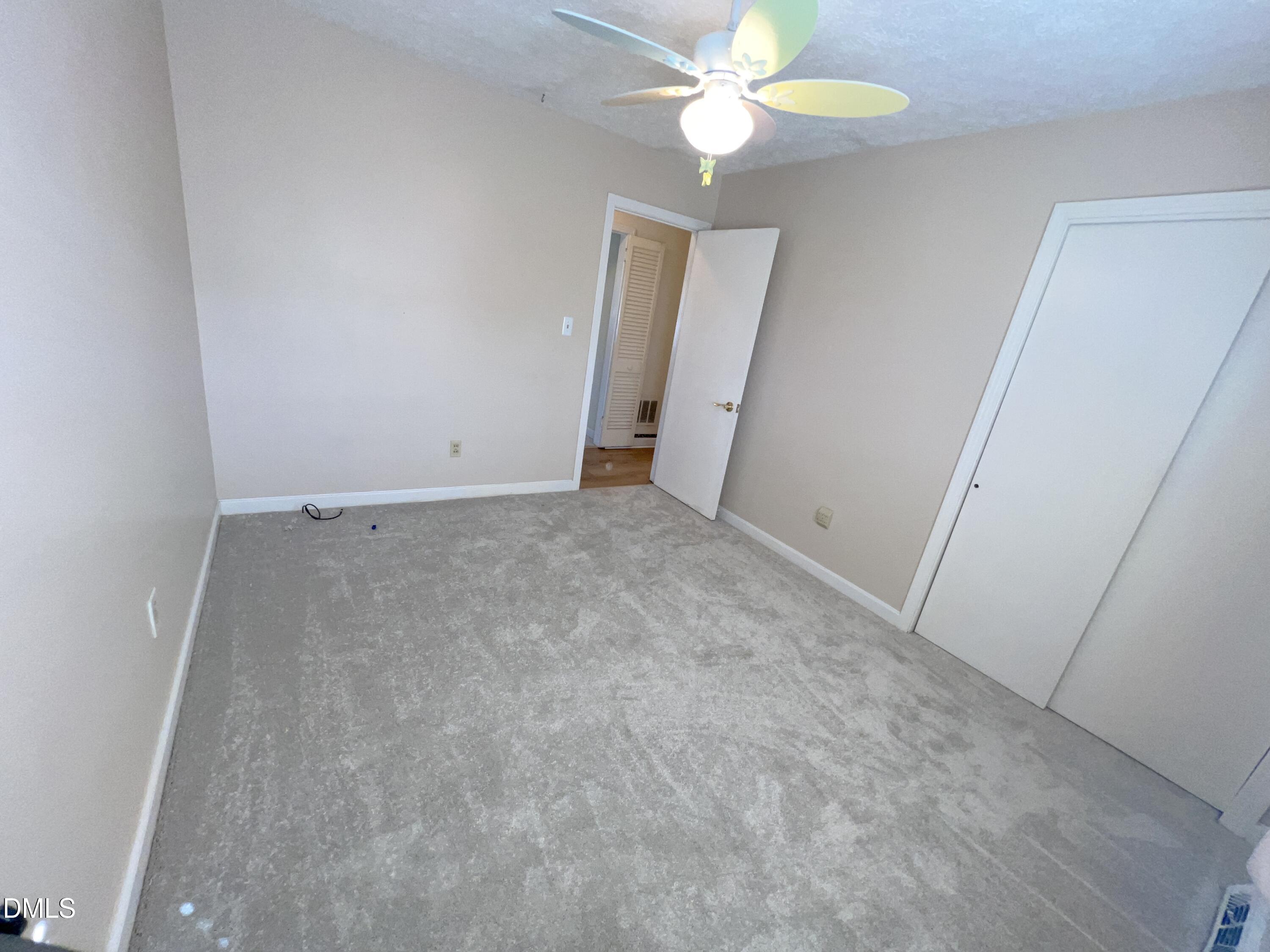 66 Allensville Road Roxboro, NC 27573 - Photo 22 of 52 an empty room with a mirror and a fan