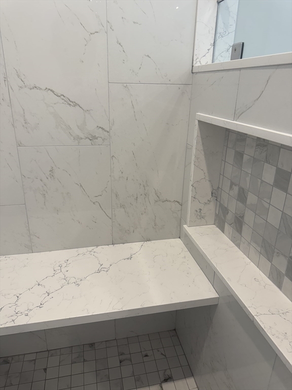 27 James Road, Unit 2 Upton, MA 01568 - Photo 11 of 31 a bathroom with a bathtub and a shower