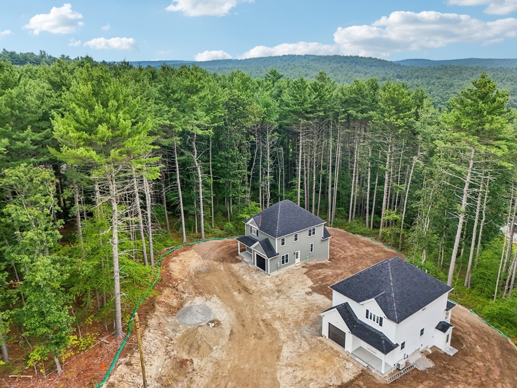 27 James Road, Unit 2 Upton, MA 01568 - Photo 13 of 31 a view of backyard with furniture and garden
