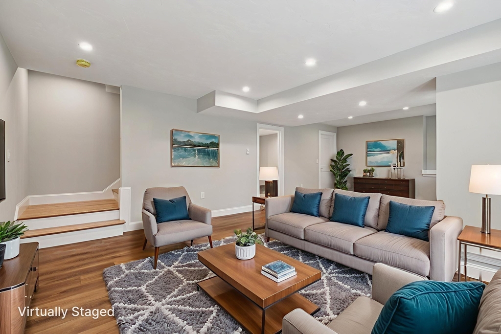 27 James Road, Unit 2 Upton, MA 01568 - Photo 18 of 31 a living room with furniture and a couch