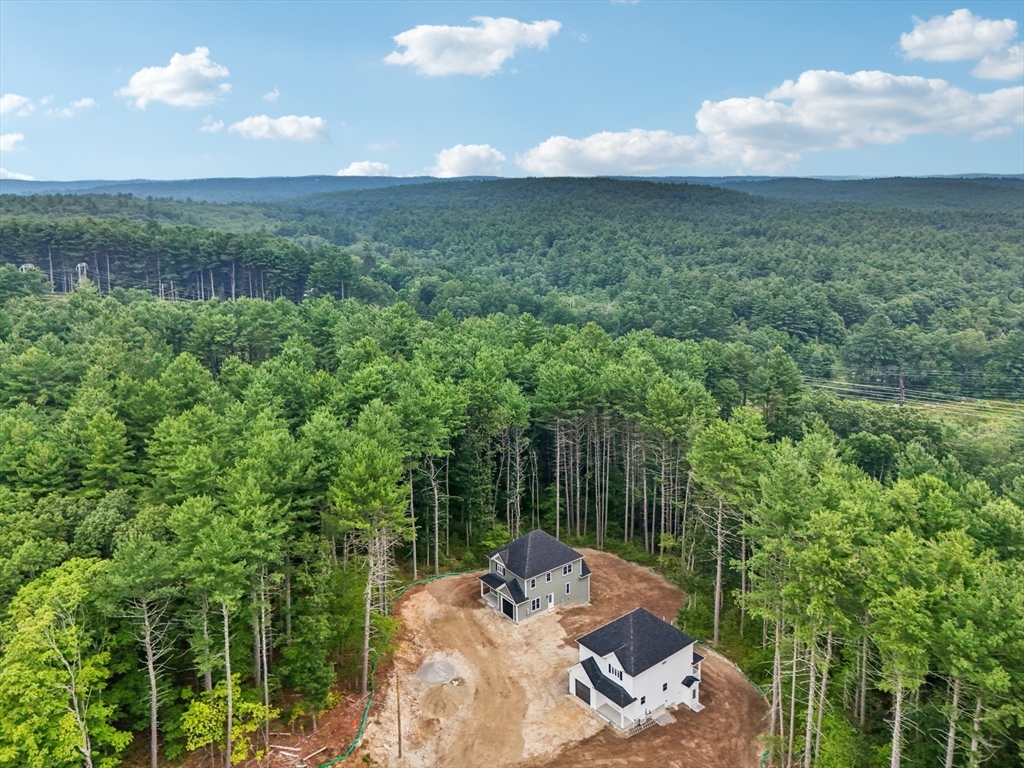 27 James Road, Unit 2 Upton, MA 01568 - Photo 24 of 31 a view of a garden with a table and chairs