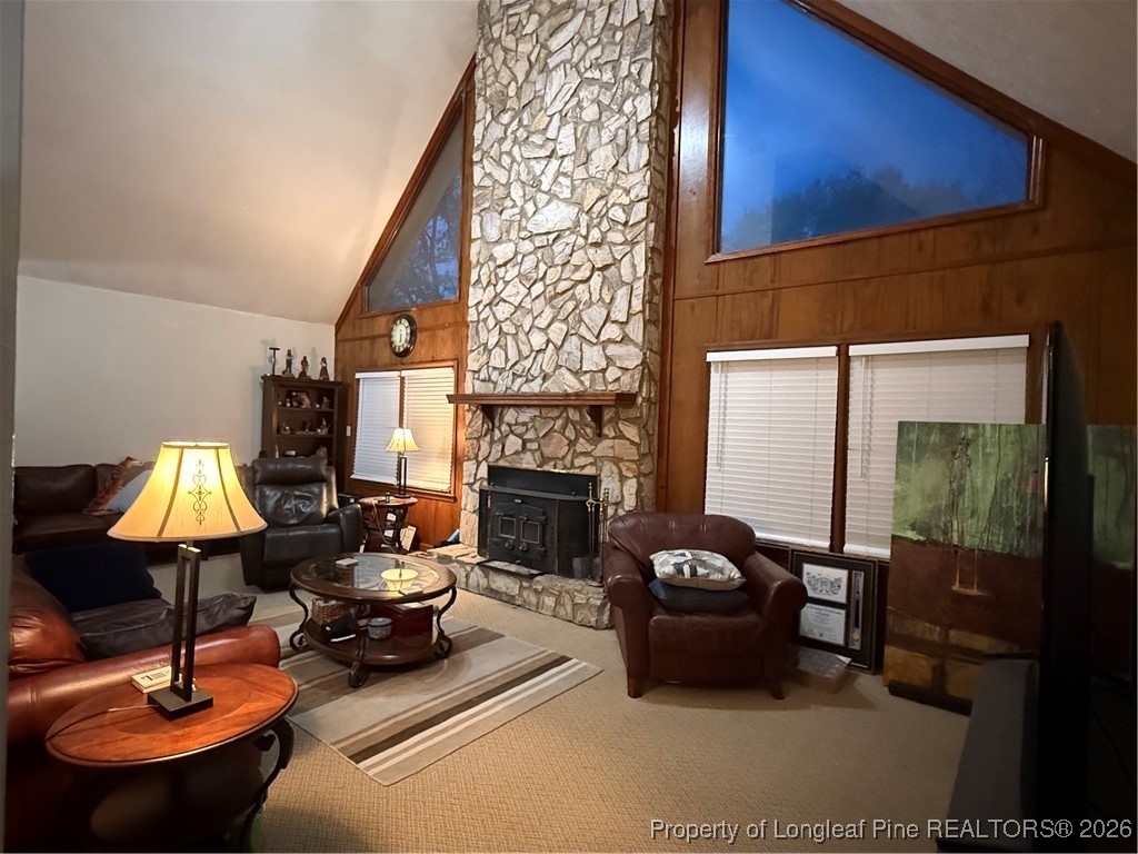 308 Lewis Street Red Springs, NC 28377 - Photo 14 of 18 a living room with furniture and a fireplace