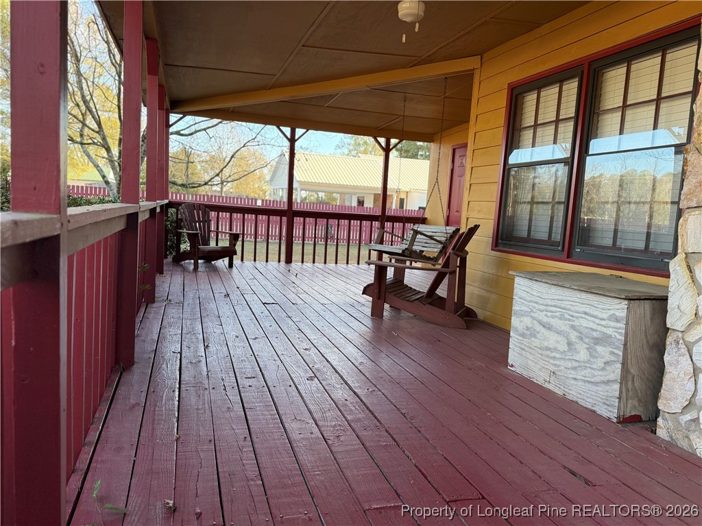 308 Lewis Street Red Springs, NC 28377 - Photo 3 of 18 a view of a two chairs with wooden floor