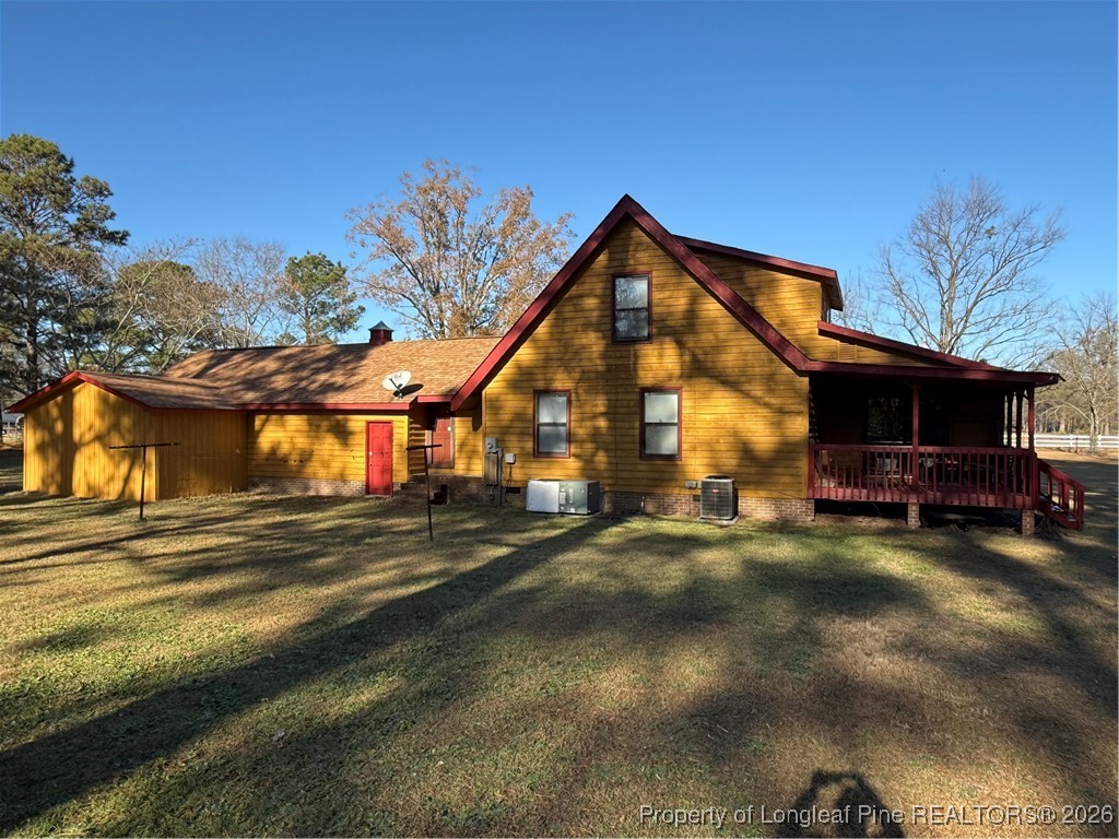 308 Lewis Street Red Springs, NC 28377 - Photo 6 of 18 a view of a house with a yard