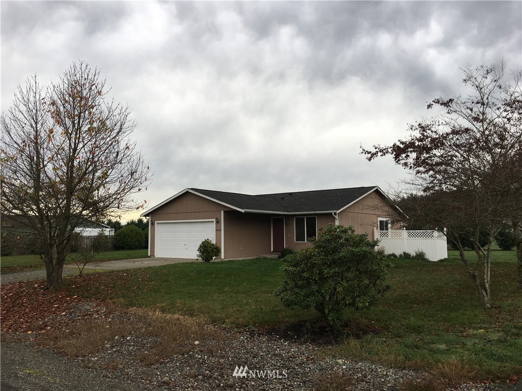 18234 Tamara Lane Southwest Rochester, WA 98579 - Photo 3 of 25 a view of house with garden