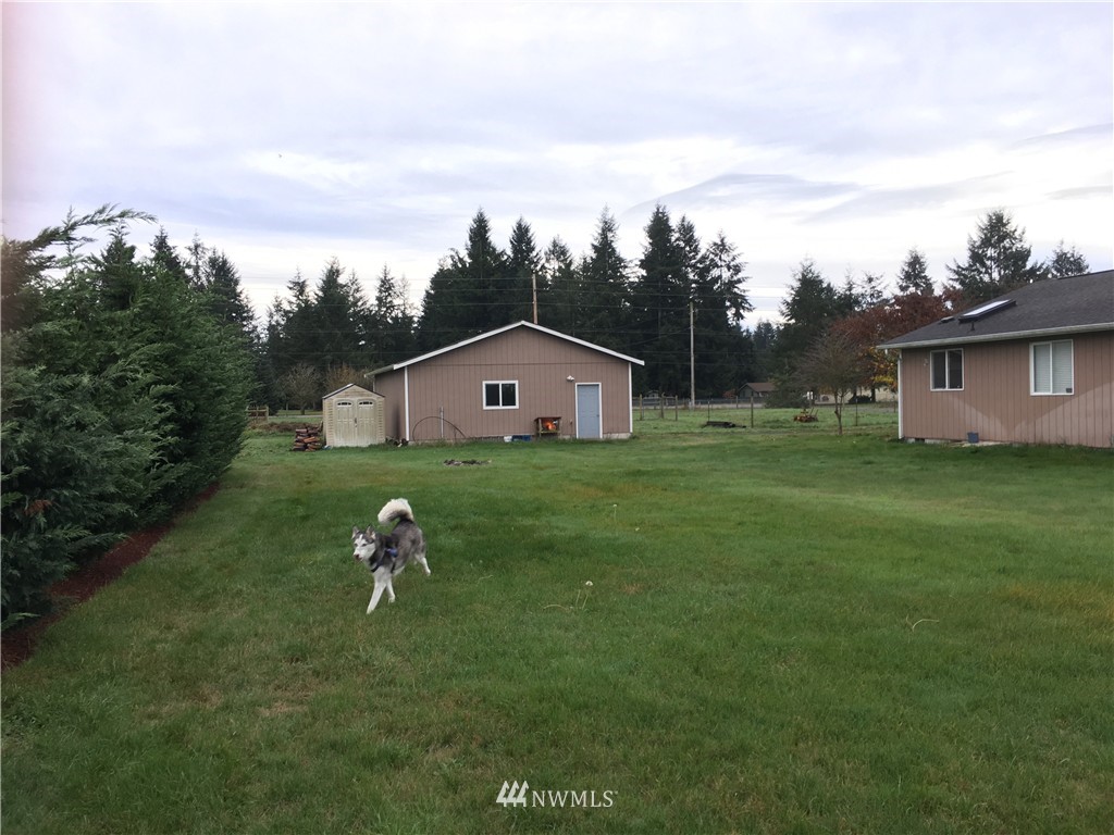 18234 Tamara Lane Southwest Rochester, WA 98579 - Photo 24 of 25 a house view with a garden space
