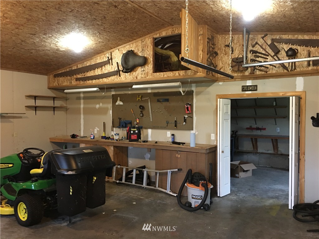 18234 Tamara Lane Southwest Rochester, WA 98579 - Photo 10 of 25 a view of a room with gym equipment