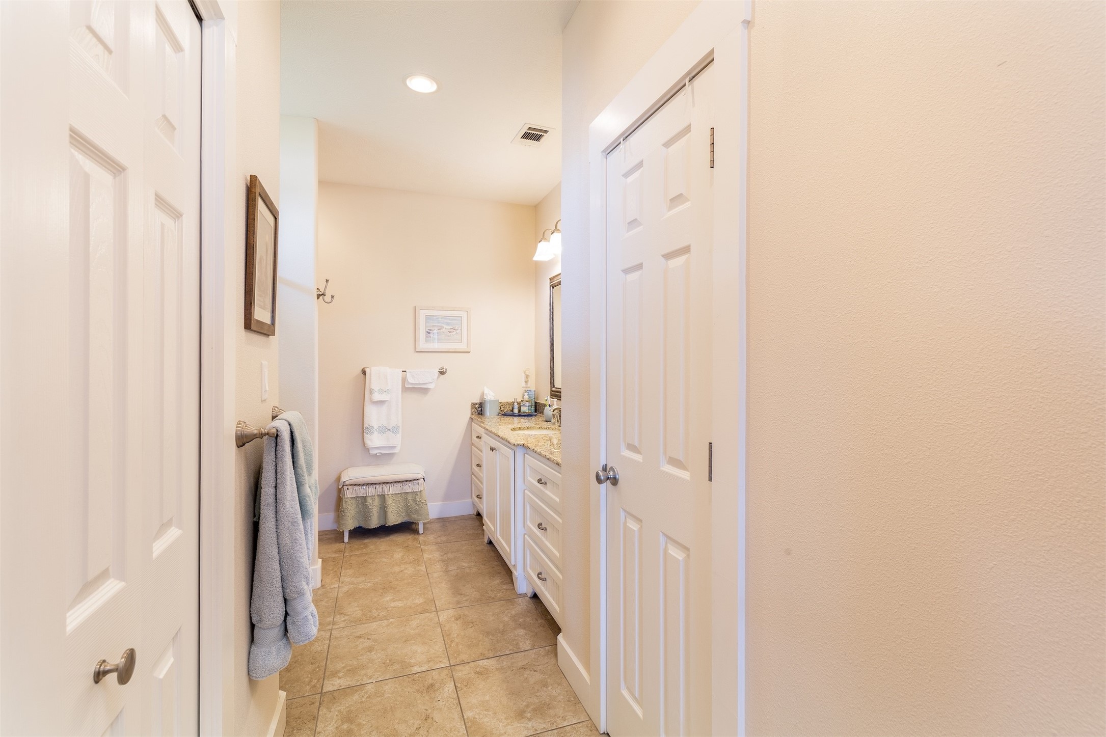 2383 Sandpiper Crystal Beach, TX 77650 - Photo 13 of 39 Primary bath has two closets for clothes and linens.
