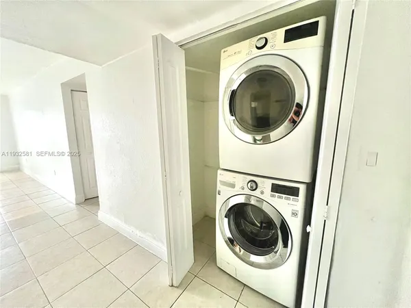 a view of a washer and dryer in a utility room