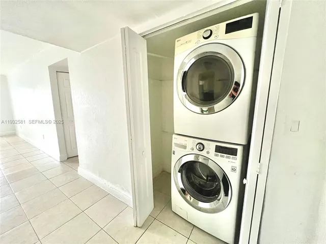 a view of a washer and dryer in a utility room
