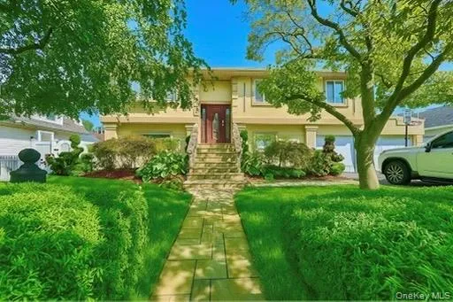 a view of a house with a garden