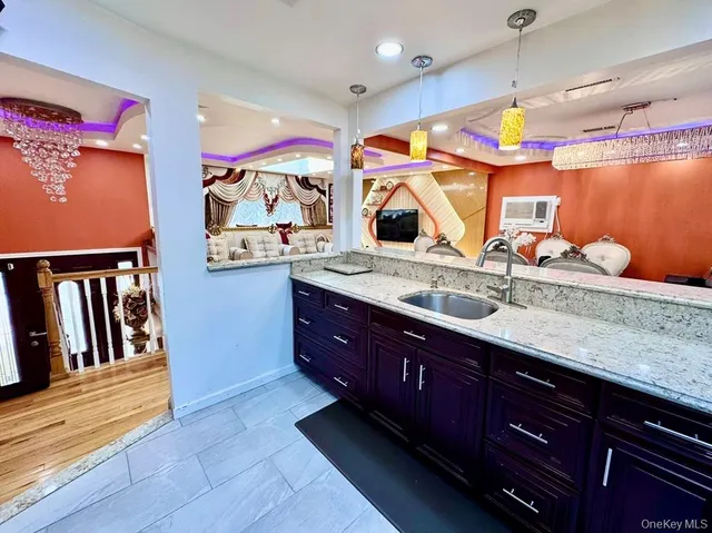 a bedroom with a bed and lamp