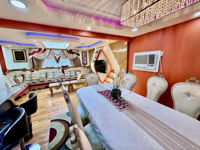 a bedroom with a large bed and a large window