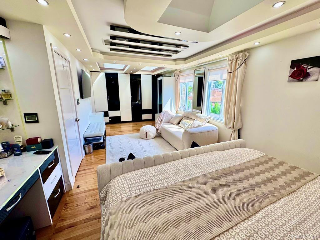 62 Walnut Road Inwood, NY 11096 - Photo 20 of 31 a bedroom with furniture and a large window