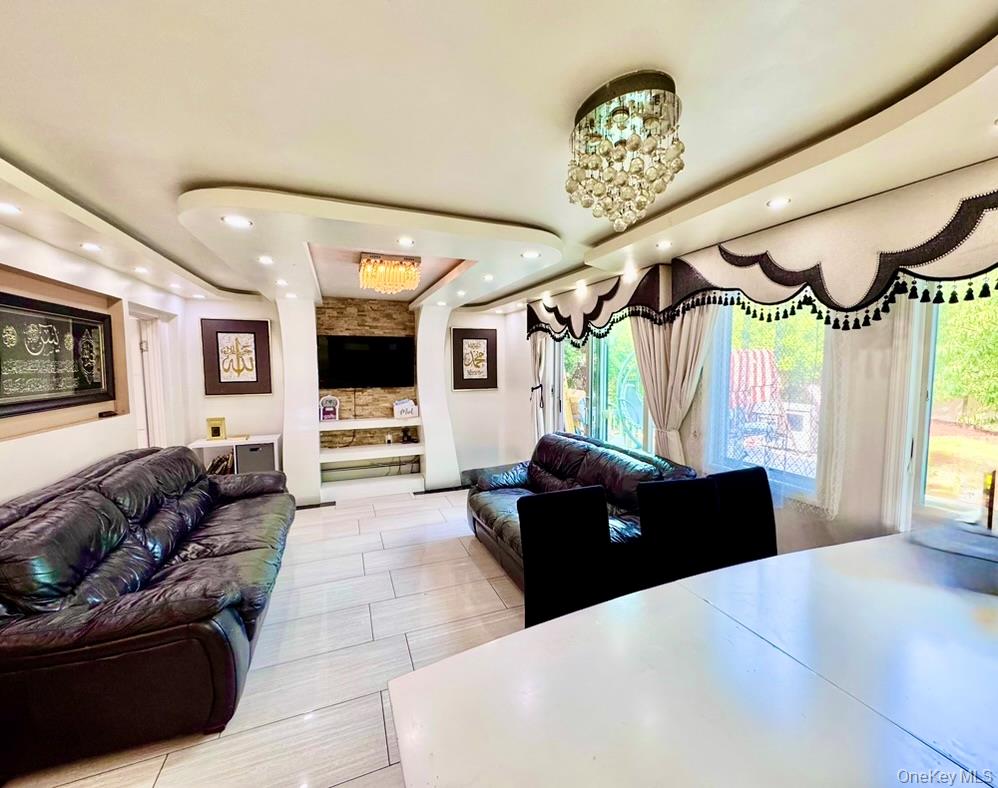 62 Walnut Road Inwood, NY 11096 - Photo 24 of 31 a living room with furniture and a large window