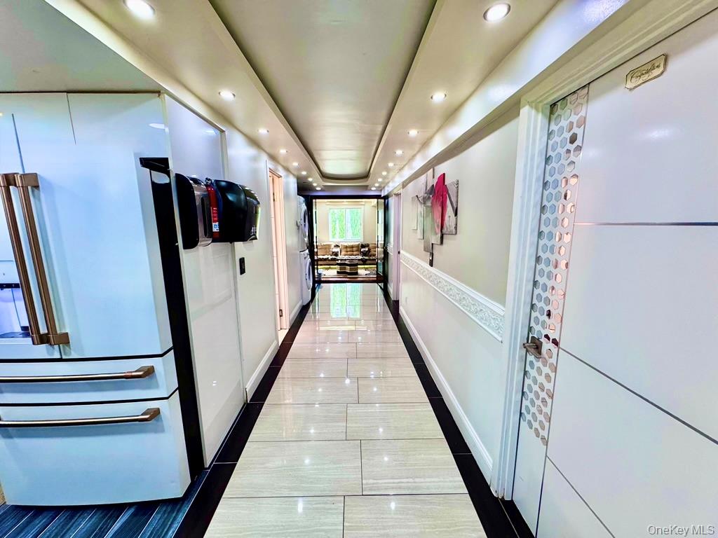 62 Walnut Road Inwood, NY 11096 - Photo 25 of 31 a hallway with stairs