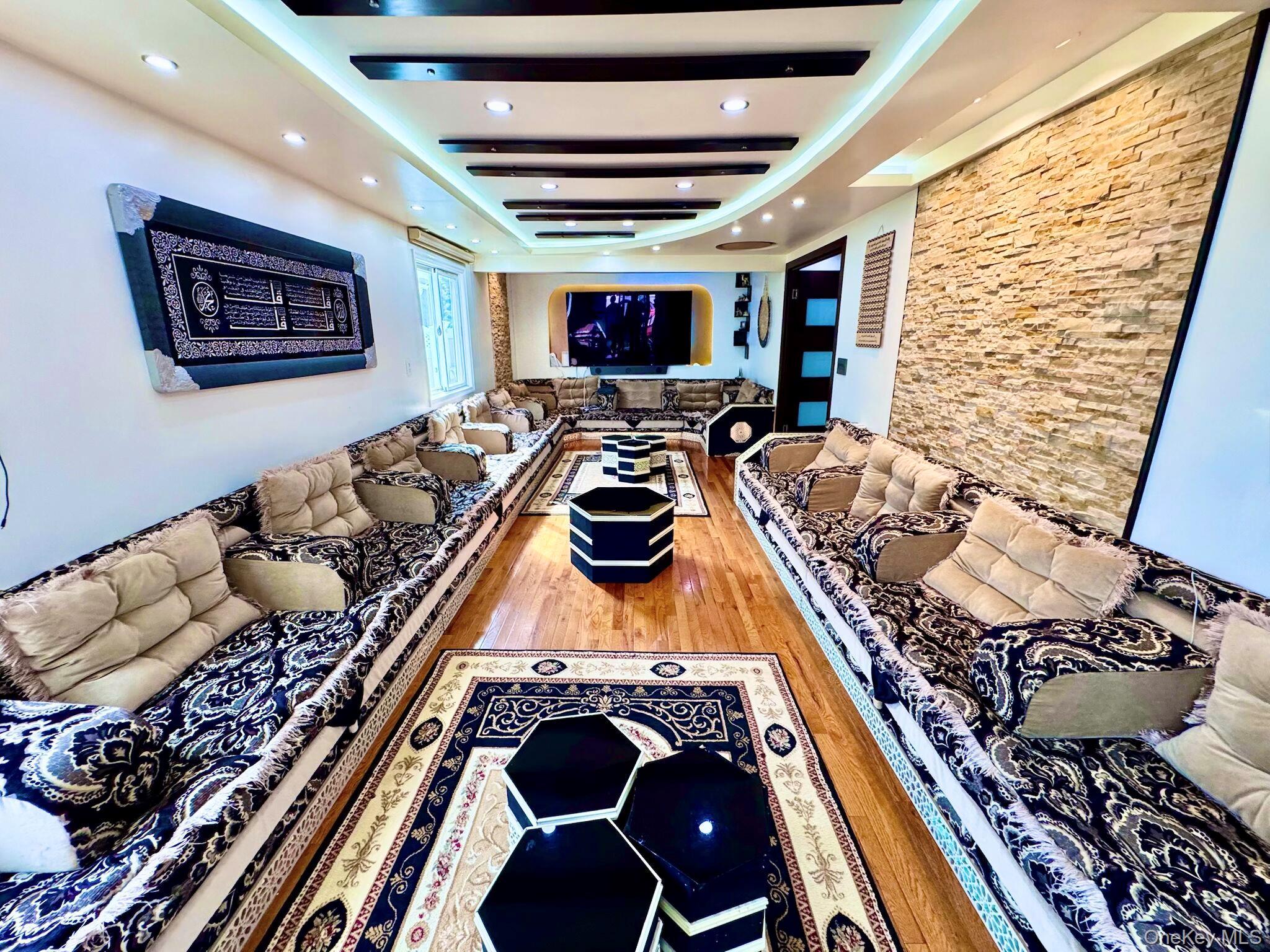 62 Walnut Road Inwood, NY 11096 - Photo 27 of 31 a bed room with furniture and a rug