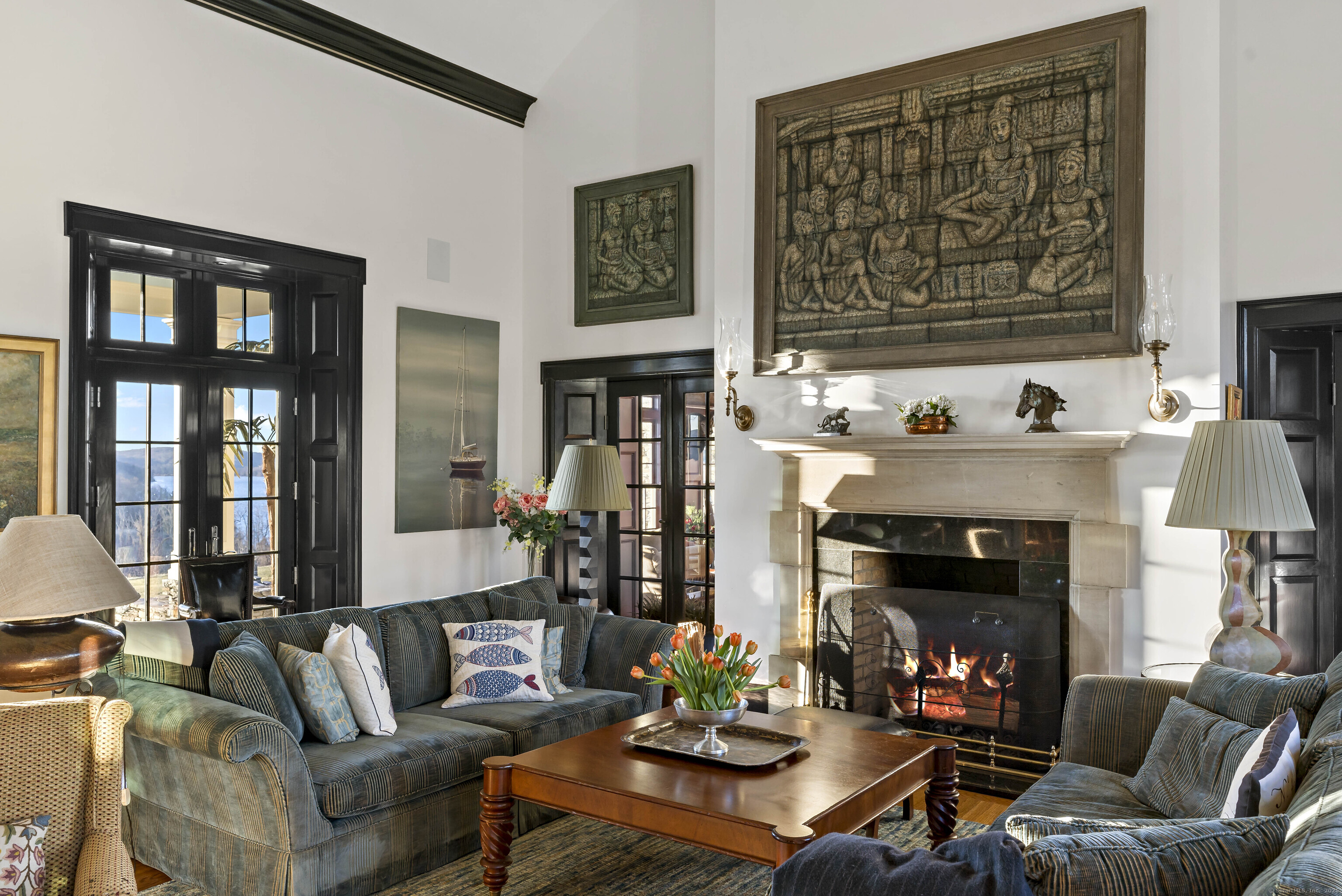 153 Ferry Road Lyme, CT 06371 - Photo 13 of 32 a living room with furniture and a fireplace