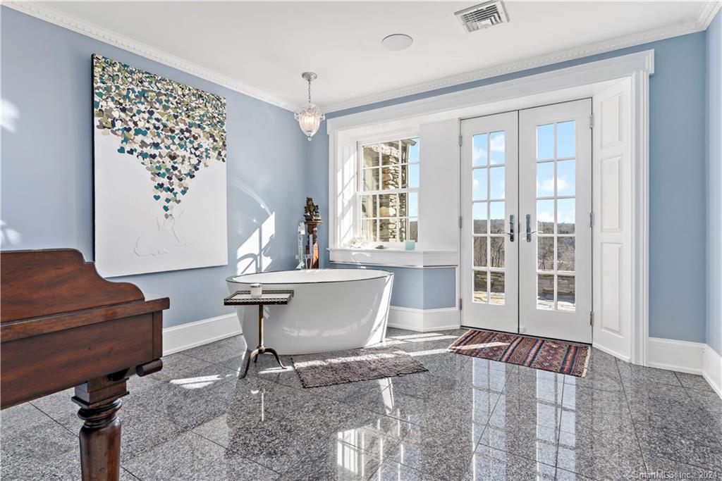 153 Ferry Road Lyme, CT 06371 - Photo 22 of 32 a living room with furniture and a window