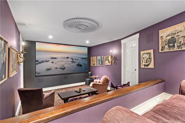 a bedroom with furniture and wall painting