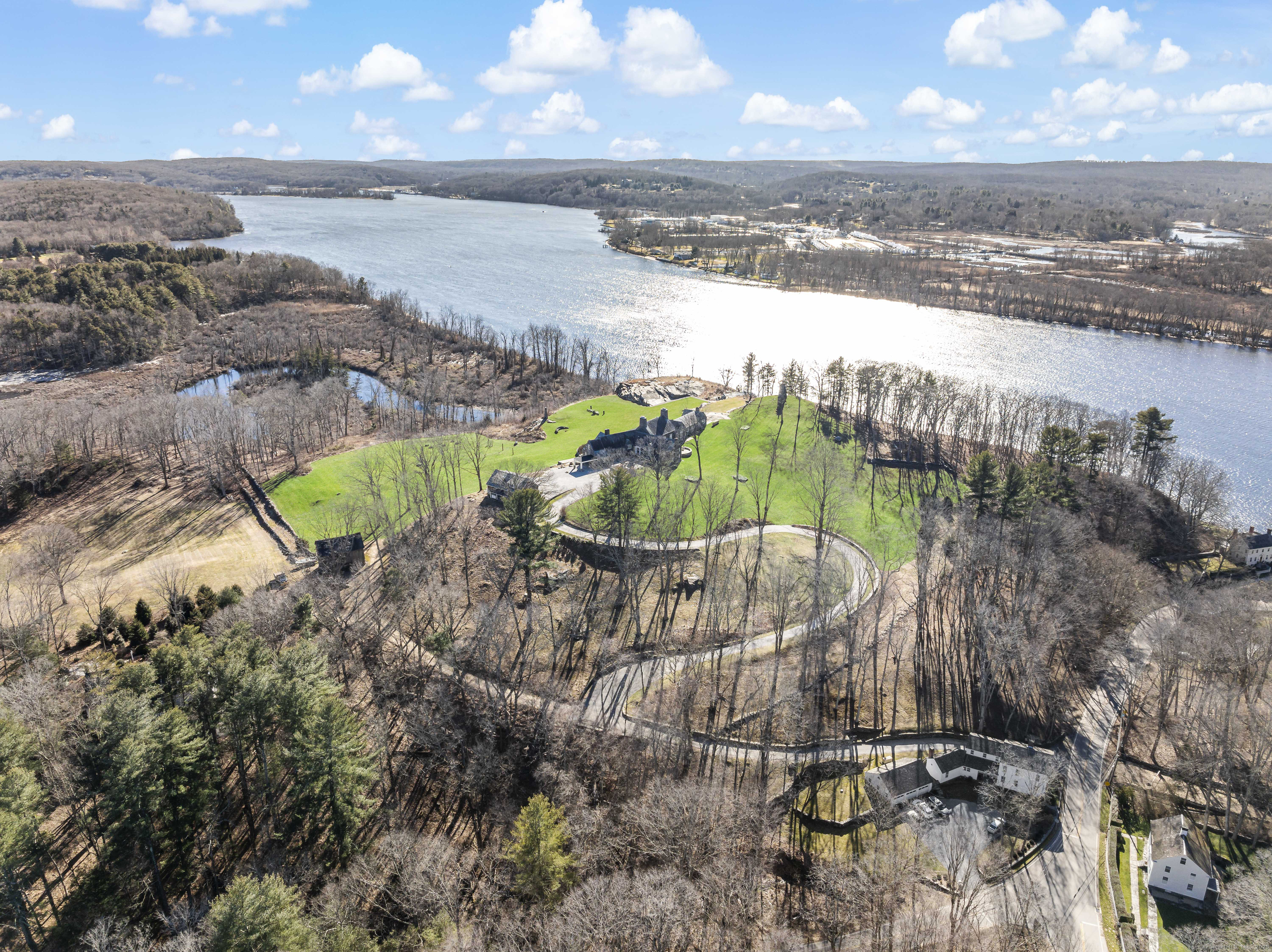 153 Ferry Road Lyme, CT 06371 - Photo 4 of 32 a view of a lake with a yard