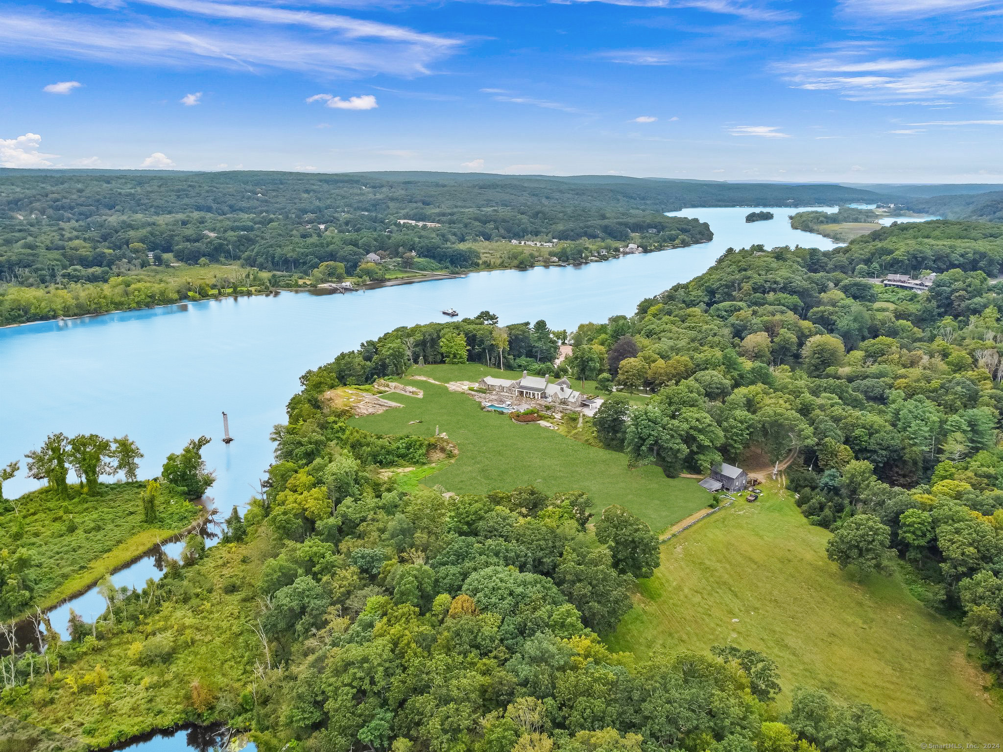 153 Ferry Road Lyme, CT 06371 - Photo 5 of 32 a view of a lake with a yard