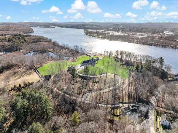 a view of a lake with a yard