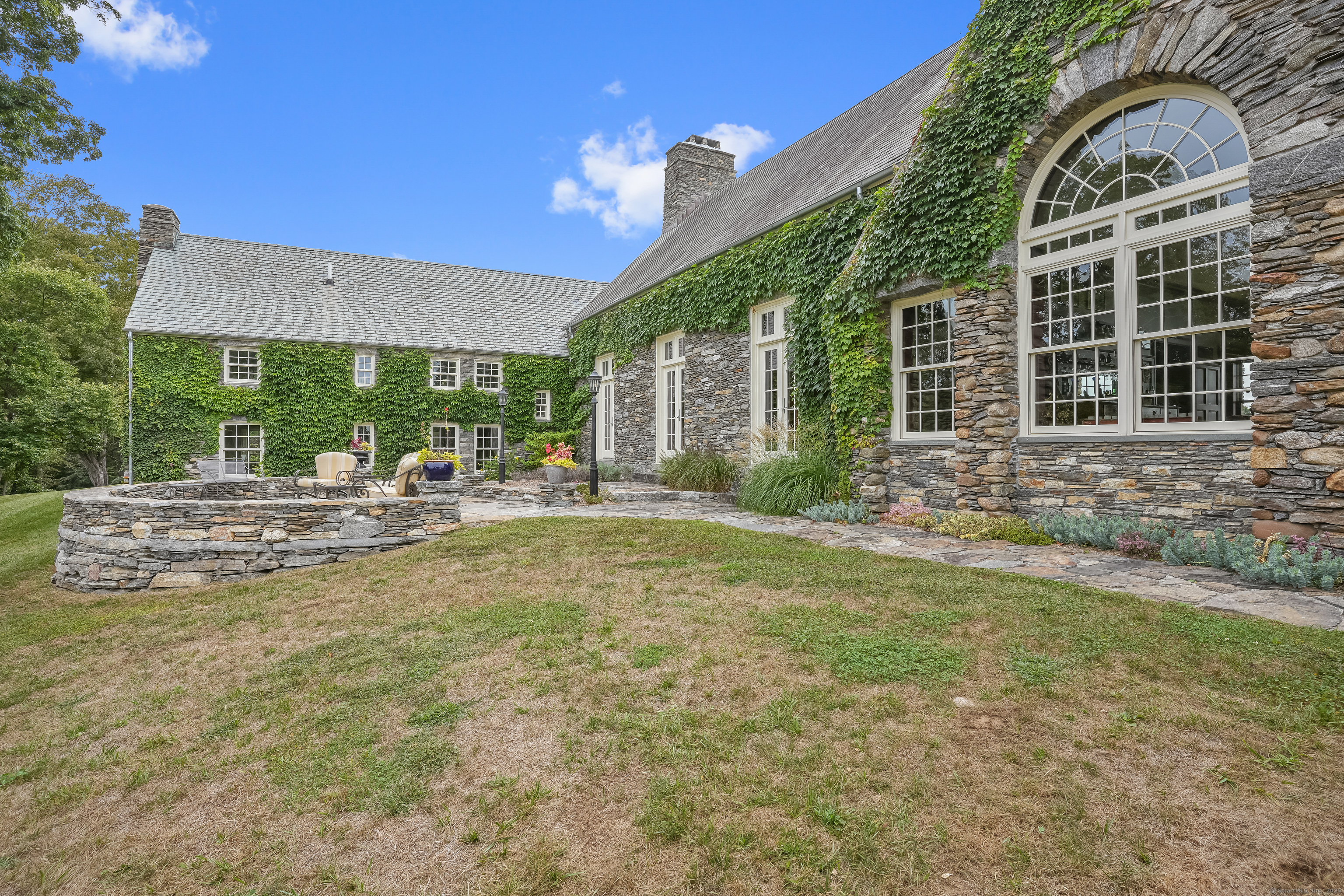 153 Ferry Road Lyme, CT 06371 - Photo 10 of 32 a view of a house with backyard and sitting area