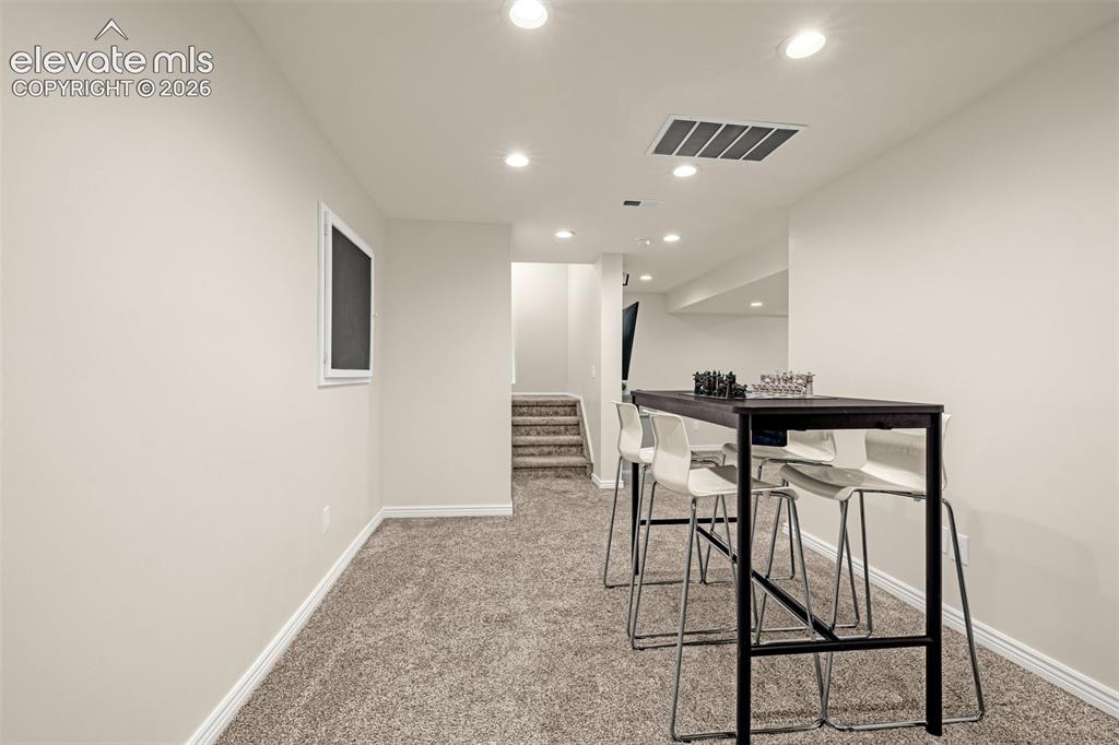 9127 Oakmont Road Peyton, CO 80831 - Photo 33 of 49 a view of a hallway with seating area