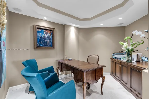 a view of a hallway with entryway and stairs