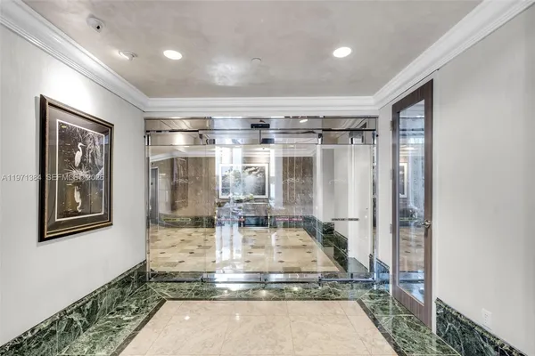a view of a very nice looking living room with a large window