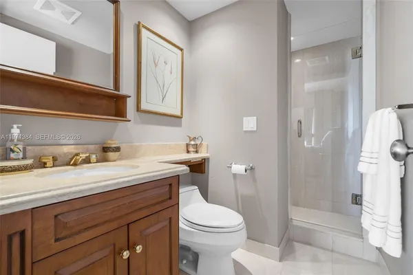 a utility room with sink dryer and washer