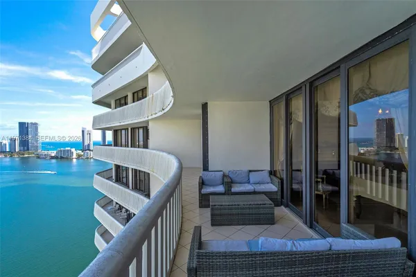 a view of a balcony with city view