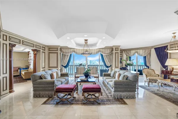 a living room with furniture and a table