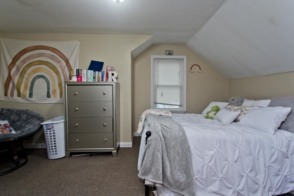 90 Spear Road Springfield, MA 01119 - Photo 16 of 19 a bedroom with a bed and a dresser