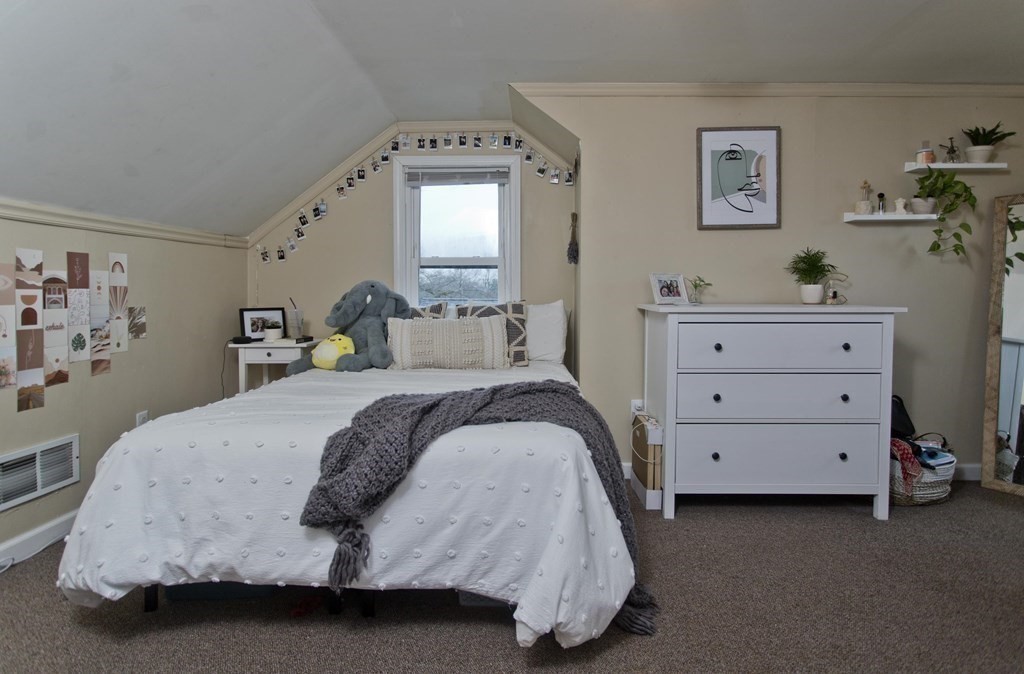 90 Spear Road Springfield, MA 01119 - Photo 18 of 19 a bedroom with a bed and window