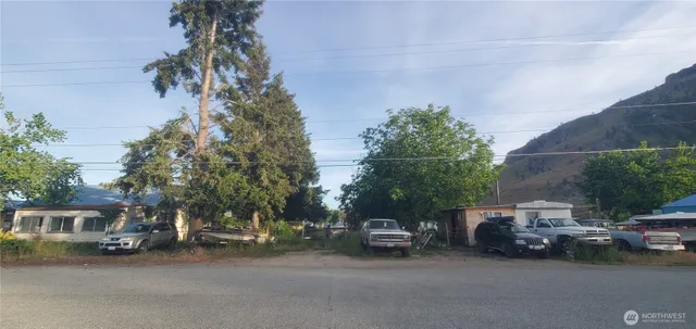 a view of a car parked in front of a house