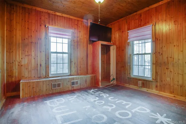 an empty room with windows