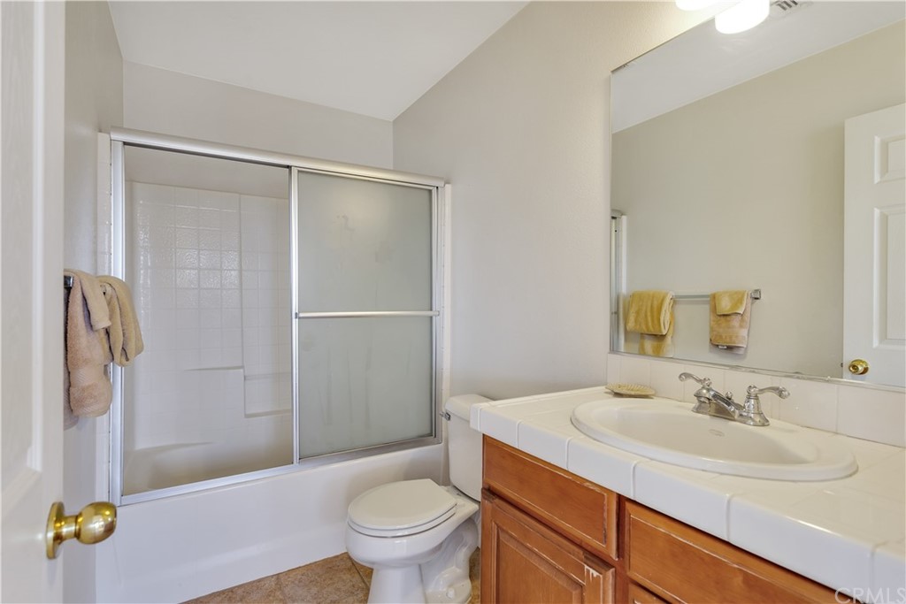 62401 Sunflower Road Joshua Tree, CA 92252 - Photo 37 of 75 a bathroom with a sink toilet and shower