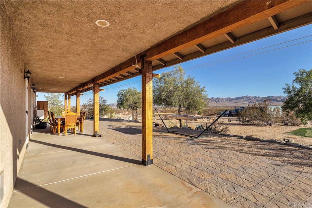 62401 Sunflower Road Joshua Tree, CA 92252 - Photo 41 of 75 a view of a outdoor space with seating area