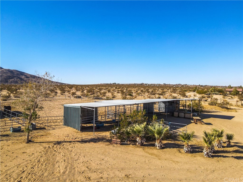 62401 Sunflower Road Joshua Tree, CA 92252 - Photo 64 of 75 a view of a house with a yard