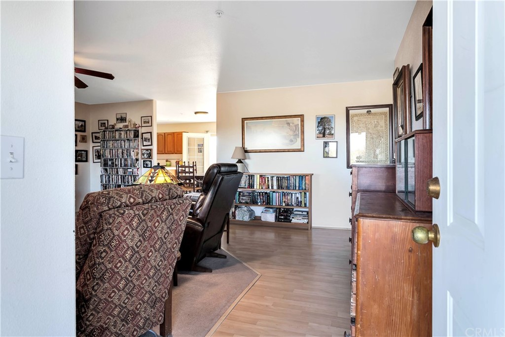 62401 Sunflower Road Joshua Tree, CA 92252 - Photo 8 of 75 a view of a workspace with furniture and a flat screen tv