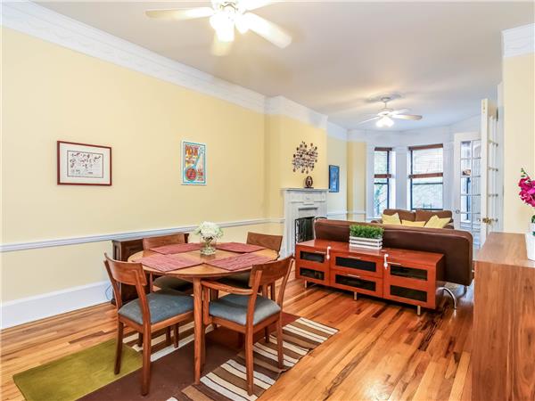 20 St Johns Place, Unit 3 Brooklyn, NY 11217 - Photo 1 of 1 a dining room with furniture and wooden floor
